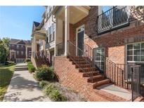 Brick townhouse exterior with a front porch and walkway at 3587 Adelaide Xing, Brookhaven, GA 30319