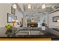 Modern kitchen with stainless steel appliances and granite countertops at 5200 Peachtree Rd # 3116, Chamblee, GA 30341
