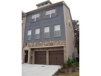 Stunning two-story home with stone accents and a two-car garage at 2114 Westhill Se Dr, Smyrna, GA 30082