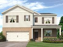 Two-story house with white siding, brown accents, and a two-car garage at 8228 Walnut Hall Dr, Fairburn, GA 30213