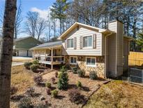 Attractive two-story house with stone accents and a deck at 4331 Brandon Ridge Ne Dr, Marietta, GA 30066