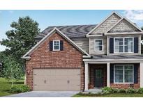 Two-story brick home with gray accents and a two-car garage at 485 Paces Dr, Lithia Springs, GA 30122