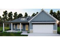 Craftsman style home with gray siding, white trim, and a two-car garage at 8981 Callaway Dr, Winston, GA 30187