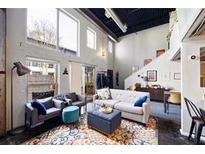 Spacious living room with high ceilings and lots of natural light at 195 Arizona Ne Ave # 179, Atlanta, GA 30307