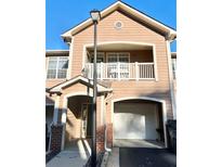 Two-story townhome with attached garage and balcony at 3500 Sweetwater Rd # 424, Duluth, GA 30096