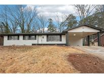 Newly renovated ranch home with carport at 2401 Winshire Dr, Decatur, GA 30035