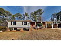 Ranch style home with mature trees and a spacious yard at 2422 Tiffany Cir, Decatur, GA 30035
