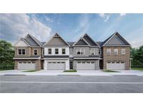Four-unit townhome building, featuring three-story brick elevations with gray and white accents at 3106 Marbella Cir # 3, Kennesaw, GA 30152