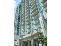 Modern high-rise building with numerous balconies and city views at 250 Pharr Ne Rd # 1704, Atlanta, GA 30305