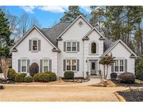 Two-story house with gray shutters and landscaping at 550 Bircham Way, Roswell, GA 30075
