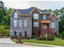 Stunning brick home with multi-level design and landscaping at 2914 Battlecrest Dr, Decatur, GA 30034