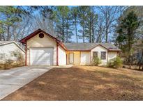 Ranch style home with attached garage and large backyard at 176 Old Atlanta Rd, Stockbridge, GA 30281