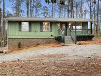 Charming ranch home with updated exterior and landscaping at 170 Eldorado Dr, Carrollton, GA 30116