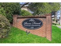 Paces Forest Courtyard Condominiums entrance sign at 4282 at 4282 Roswell Ne Rd # G2, Atlanta, GA 30342