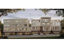 Contemporary townhome exterior boasts a sleek design with multiple balconies and attached garages at 00 Kingsboro Rd # 1, Atlanta, GA 30326