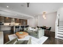 Inviting living room and kitchen combination featuring modern furnishings and stainless steel appliances at 504 Rankin Ne St # 4, Atlanta, GA 30308
