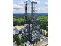 Modern high-rise condo with a beautiful glass exterior and green surroundings at 3630 Peachtree Ne Rd # 3401, Atlanta, GA 30326