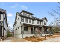 Stunning two-story modern farmhouse with covered porch, meticulous landscaping, and ample driveway space at 965 Boulevard Se # A, Atlanta, GA 30312