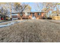 Charming single-story brick home featuring a well-manicured lawn and inviting front entrance at 1722 Detroit Nw Ave, Atlanta, GA 30314