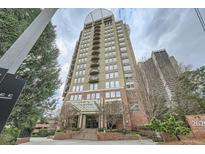 Stunning high-rise building featuring private balconies, a covered entryway, and brick facade at 2626 Peachtree Nw Rd # 804, Atlanta, GA 30305