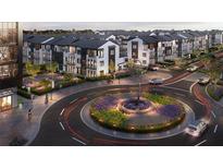 Upscale townhome community with a landscaped roundabout and modern architectural details at 5003 Hartwell Pl, Alpharetta, GA 30009