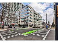 Corner condo building featuring modern architecture and streetscape view at 805 Peachtree Ne St # 317, Atlanta, GA 30308