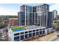 Modern high-rise building with a rooftop pool, tennis court and city views from the roof at 2425 Peachtree Rd # 1806, Atlanta, GA 30305