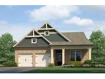 Charming brick home featuring a two-car garage and covered front porch, perfect for relaxing and curb appeal at 202 Whispering Pines Ave, Conyers, GA 30094