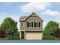 Charming two-story home with a two-car garage, and vertical siding at 1242 Riverstone Rd, Jonesboro, GA 30238