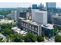 Stunning aerial view of the property's skyline, showcasing lush greenery and surrounding cityscape at 145 15Th Ne St # 1012, Atlanta, GA 30309