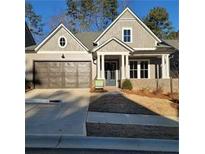 Charming single-Gathering home with a two-car garage and inviting front porch at 1279 Lakeside Overlook, Canton, GA 30114