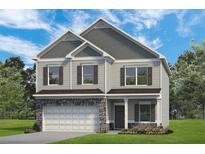 Charming two-story home featuring stone accents, neutral siding, and a two-car garage, set against a blue sky at 174 Silver Leaf Trl, Douglasville, GA 30134