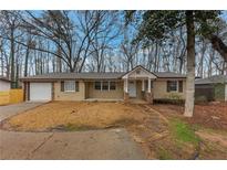 Charming single-story home with manicured front yard and attached garage at 2236 Brannen Se Rd, Atlanta, GA 30316