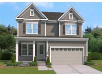 Charming two-story home featuring neutral siding, a two-car garage, a welcoming front porch, and well-manicured landscaping at 103 Cedar Brook Dr, Holly Springs, GA 30115