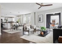 Bright open-concept living space with hardwood floors and modern furnishings at 1650 Derry Sw Ave, Atlanta, GA 30310