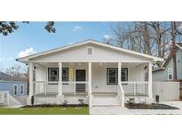 Charming renovated home featuring a welcoming front porch and freshly painted exterior at 176 Rhodesia Se Ave, Atlanta, GA 30315