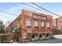 Charming brick building featuring beautiful architectural details with 