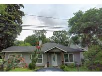 Charming one-story home featuring a covered porch, well-maintained lawn, and inviting curb appeal at 1268 Wylie Se St, Atlanta, GA 30317