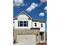 Charming two-story home with a stone-clad front and a two-car garage at 2464 Bayberry St, Acworth, GA 30101