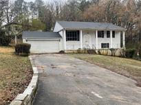 Charming two-story home with a traditional design and an attached two car garage at 2813 Petersburg Ct, Decatur, GA 30034