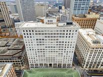 Overhead view of a multi-story building in the city, showcasing its architectural details and surrounding urban landscape at 57 Forsyth Nw St # 14D, Atlanta, GA 30303