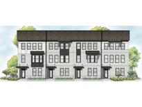 Charming exterior elevation showcasing multiple townhomes with a mix of brick and modern architectural details at 103 Holt Ln, Lawrenceville, GA 30046