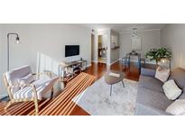 Inviting living room featuring hardwood floors and modern furnishings for a comfortable atmosphere at 1181 Church St # G, Decatur, GA 30030