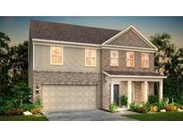 Charming two-story home features a two-car garage, covered entry, and landscaped front yard at 6095 Marigold Way, Atlanta, GA 30349