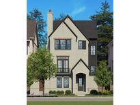 Charming two-story home featuring a mix of neutral siding and a brick chimney, complemented by dark-framed windows at 2305 Park Walke Dr, Alpharetta, GA 30009