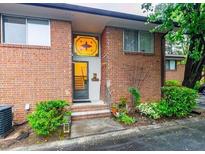 Charming brick home with a unique stained-glass window above the front door at 2570 Bradford Ne Sq, Atlanta, GA 30345