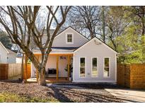 Charming bungalow-style home featuring a welcoming front porch and modern siding at 731 Hobart Se Ave, Atlanta, GA 30312