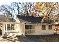 Charming single story home with a carport and front porch at 2826 Ben Hill Rd, Atlanta, GA 30344