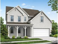 Charming two-story home with painted brick exterior, attached two car garage and covered porch at 910 Melody Ridge Ln, Buford, GA 30518