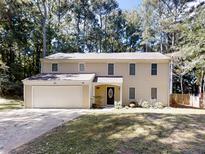 Charming two-story home with a spacious two car garage and beautiful curb appeal at 494 S Malton Ct, Stone Mountain, GA 30083